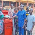 Kingdom Miracle Church of Jesus International presents sanitation items to Wenchi Assembly