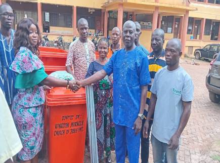 Kingdom Miracle Church of Jesus International presents sanitation items to Wenchi Assembly